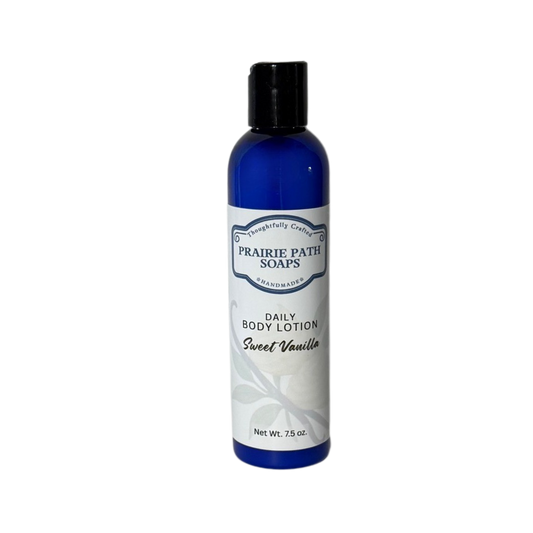 Prairie Path Soaps daily body lotion bottle with blue and white design on a white background
